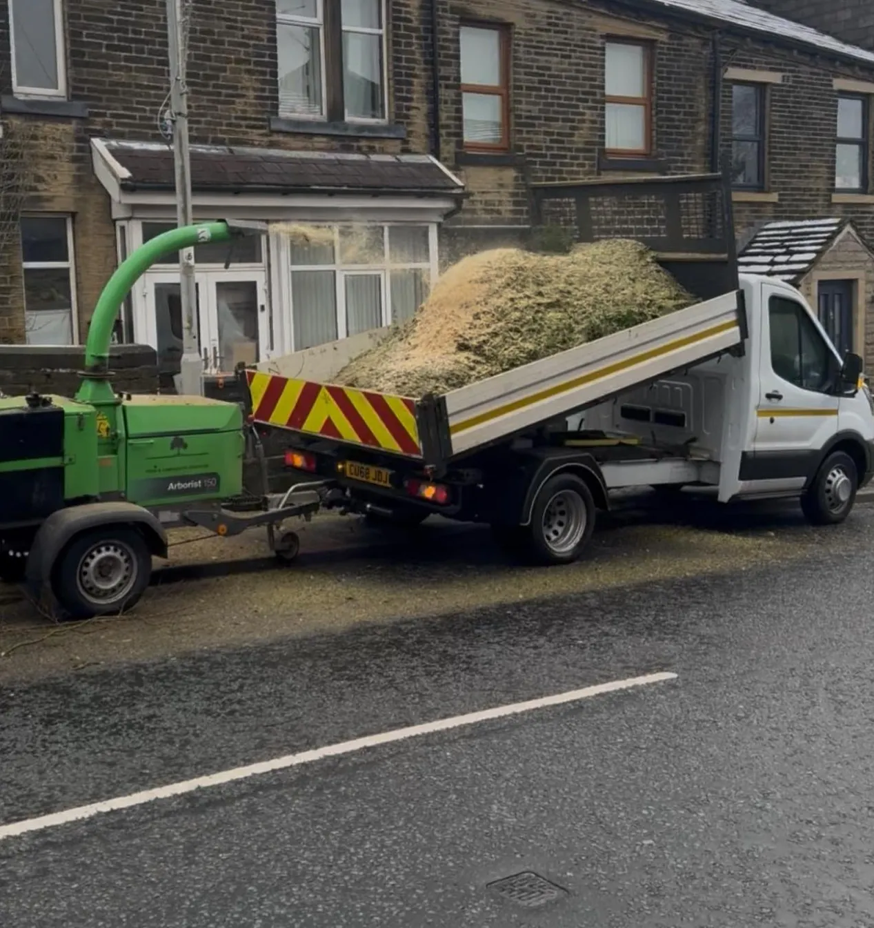 Wood chipping service truck